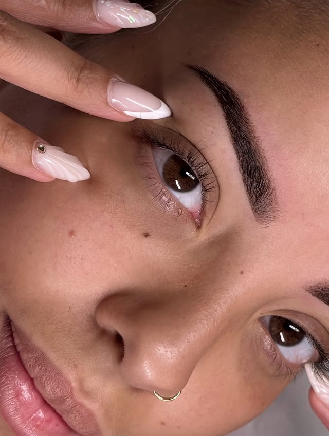Close-up of brows created with hair-stroke microblading